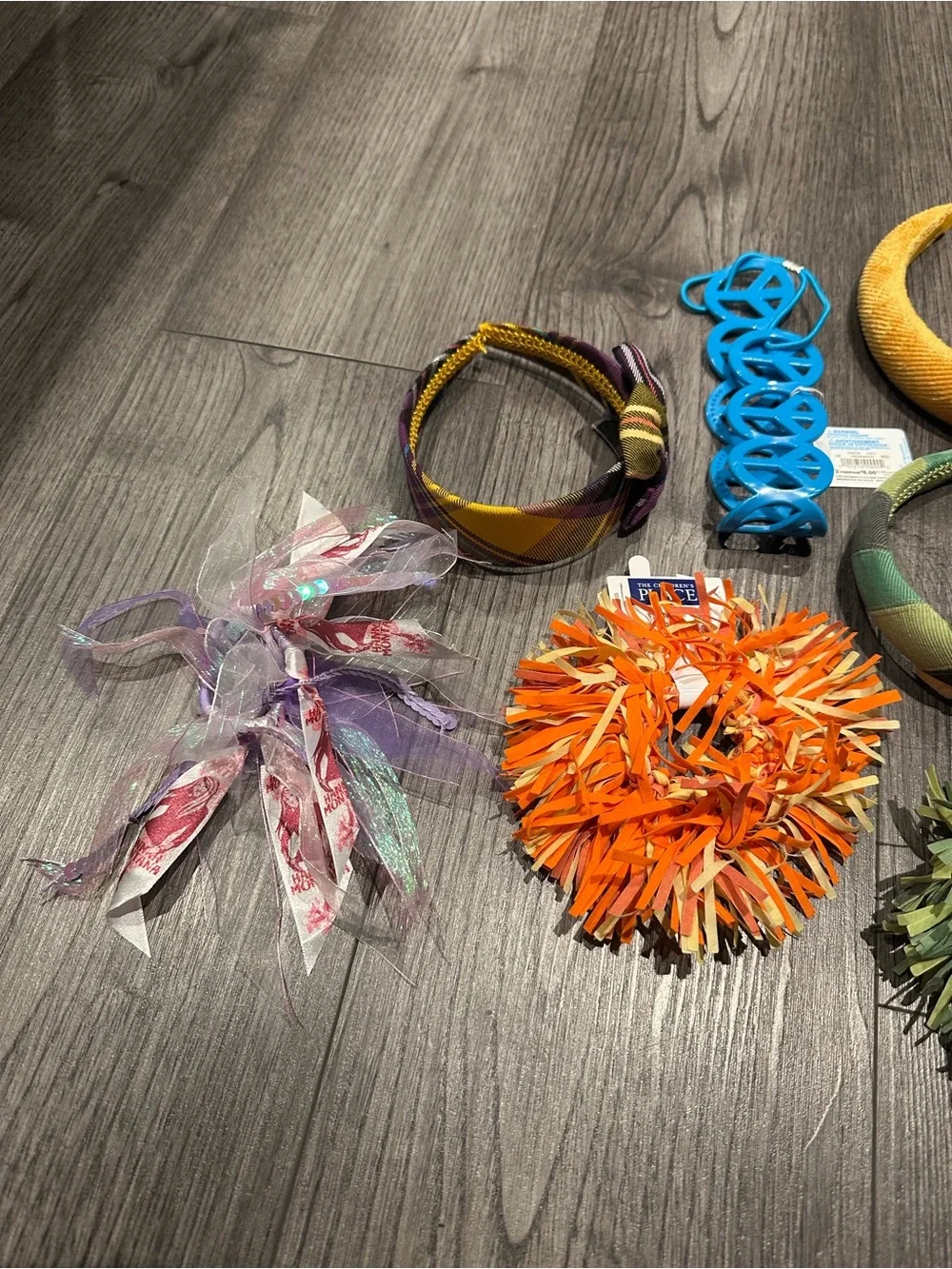 The Children's Place Orange Pom-Pom Hair Tie with Mixed Green and Black Accents